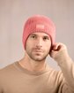 Bonnet en tricot rose