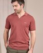 Polo en tricot rose